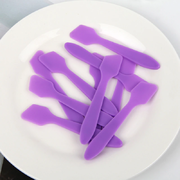 Plastic mixing spoon, violet